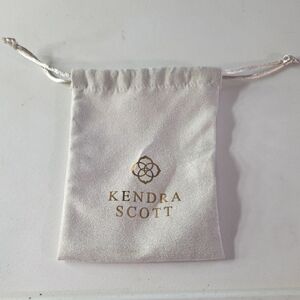 Kendra Scott Cream Pouch with Gold Logo Dustbag